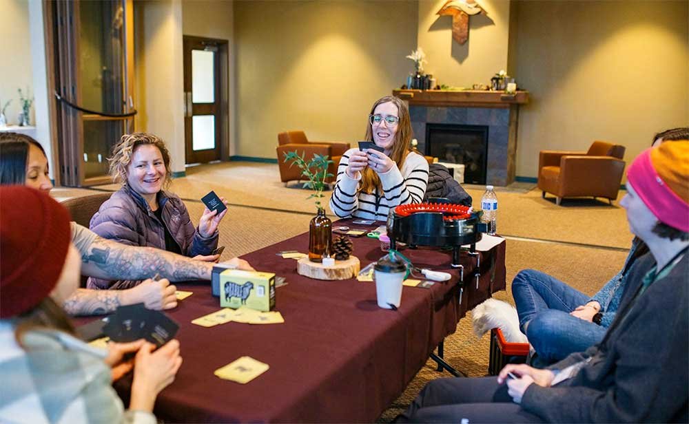 Group of women playing a card game