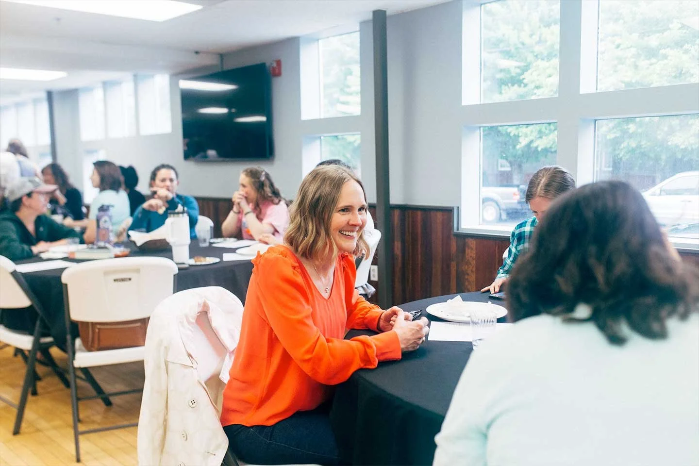 Women sitting and chatting at Harbor Church