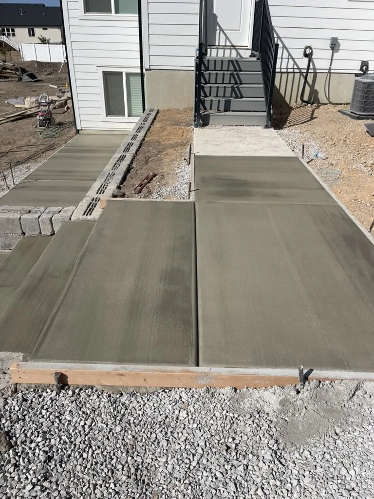Attaching concrete stairs to existing pad