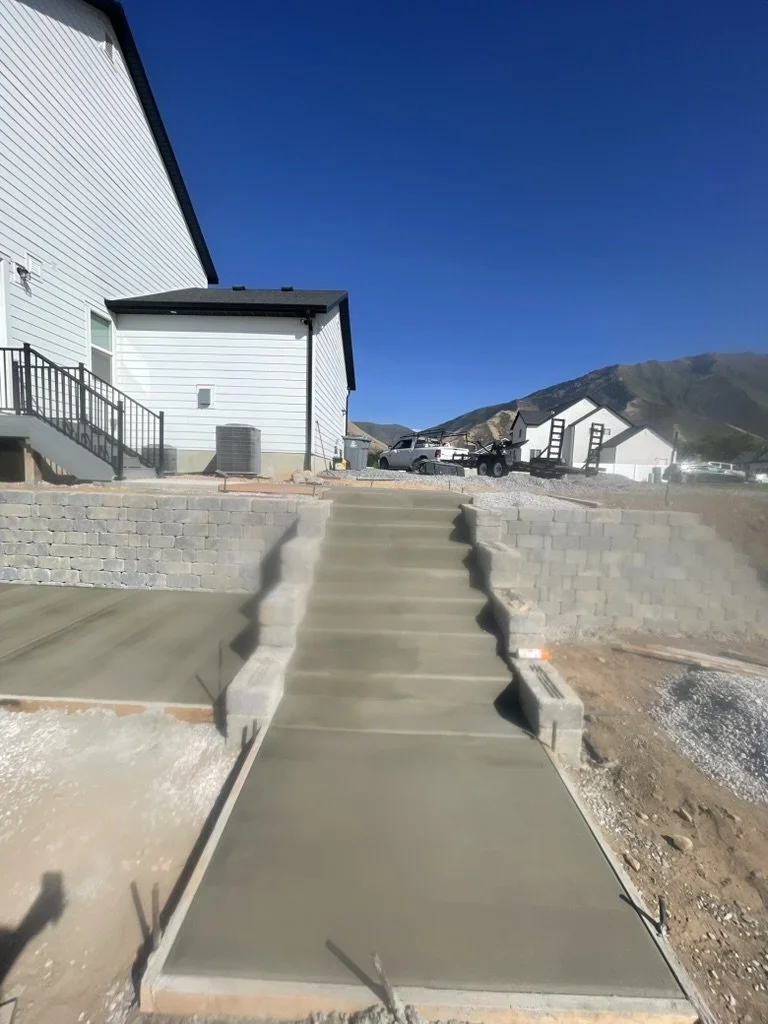 Concrete stairs between retaining walls