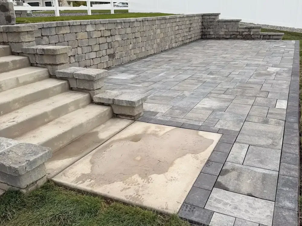Paver patio with block stairs and retaining wall in Utah