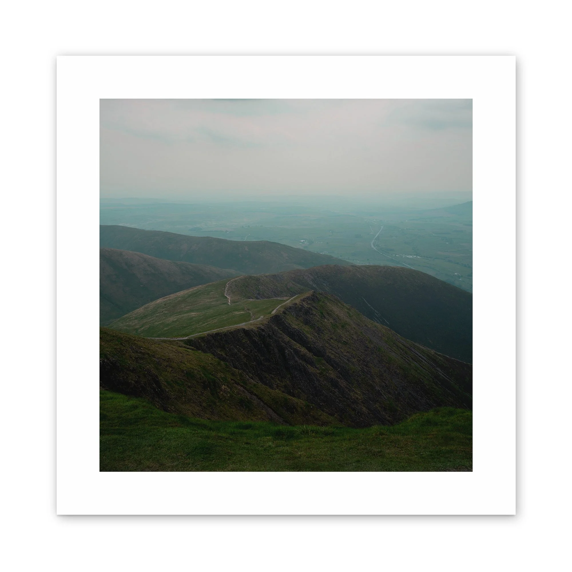 The High Path – Photograph of a high mountain ridgeline trail fading into mist, captured in the Scottish Highlands by Anthony James.