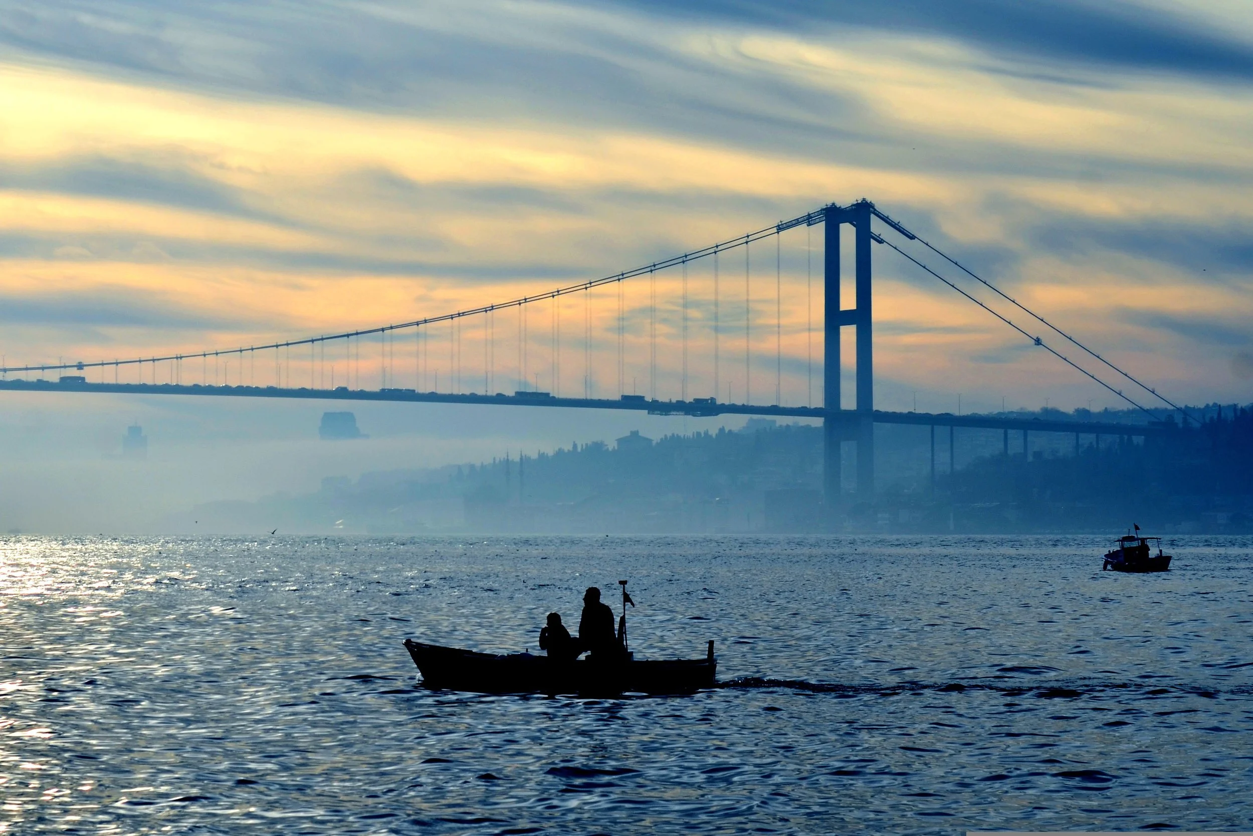 sunset-health-trip-istanbul-bridge-boat.jpg