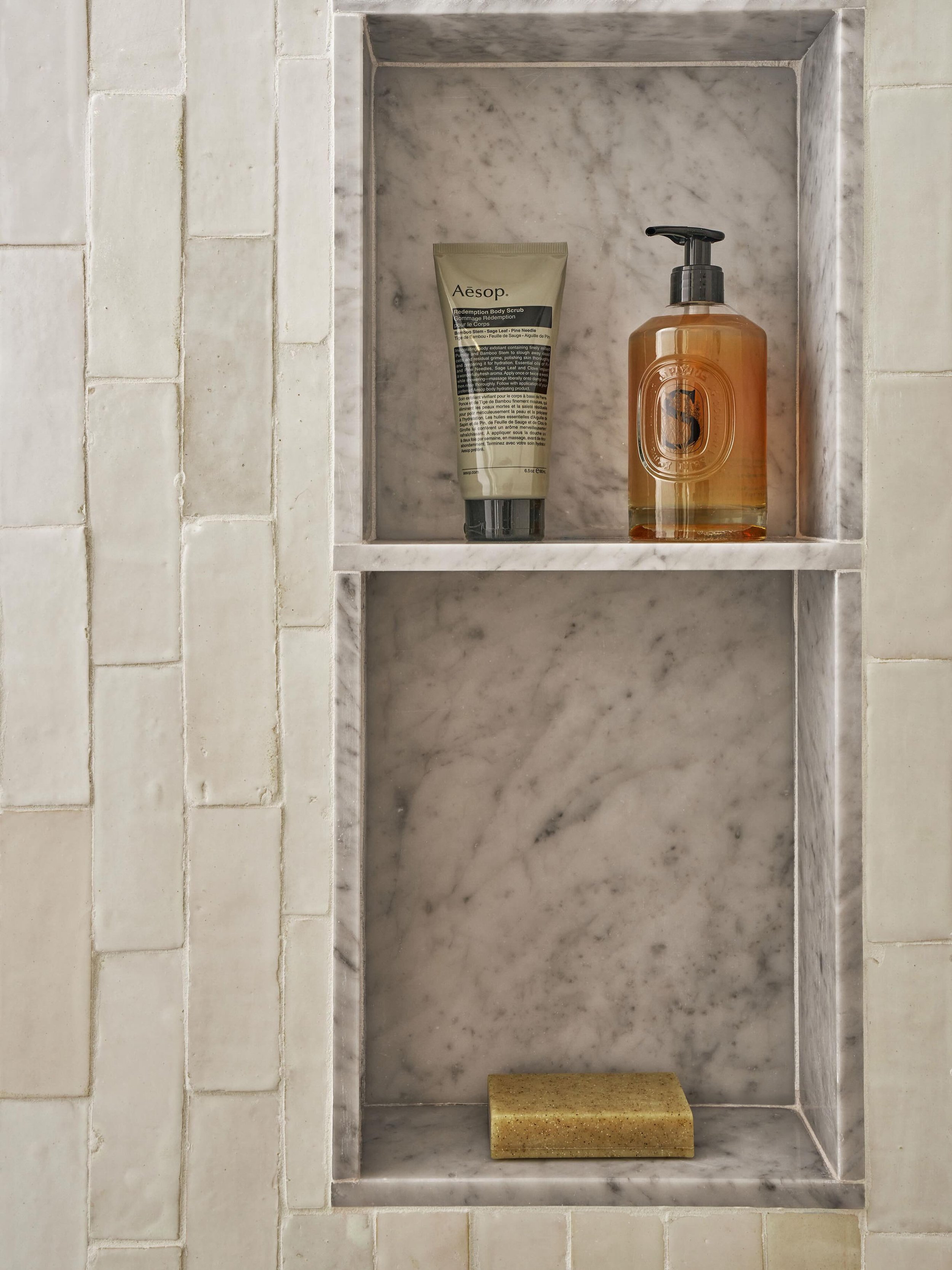 It&rsquo;s the little details that make a bathroom feel truly custom. The marble shower niche creates a beautiful contrast against the surrounding tile, adding depth and visual interest.
The same goes for your tile trim. Don&rsquo;t settle for builde