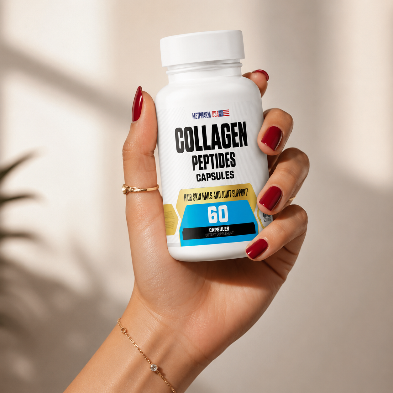 woman's hand with nice nail polish holding a bottle of collagen
