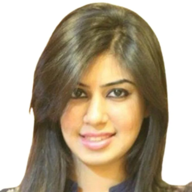 Professional headshot of a woman with long dark hair smiling