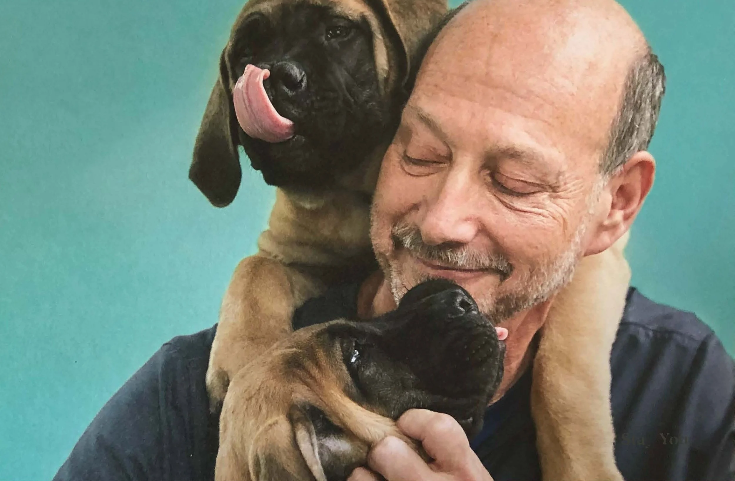 Long Run Pets Advisory Board Member | Dr. Wolchinsky Hugging a Dog
