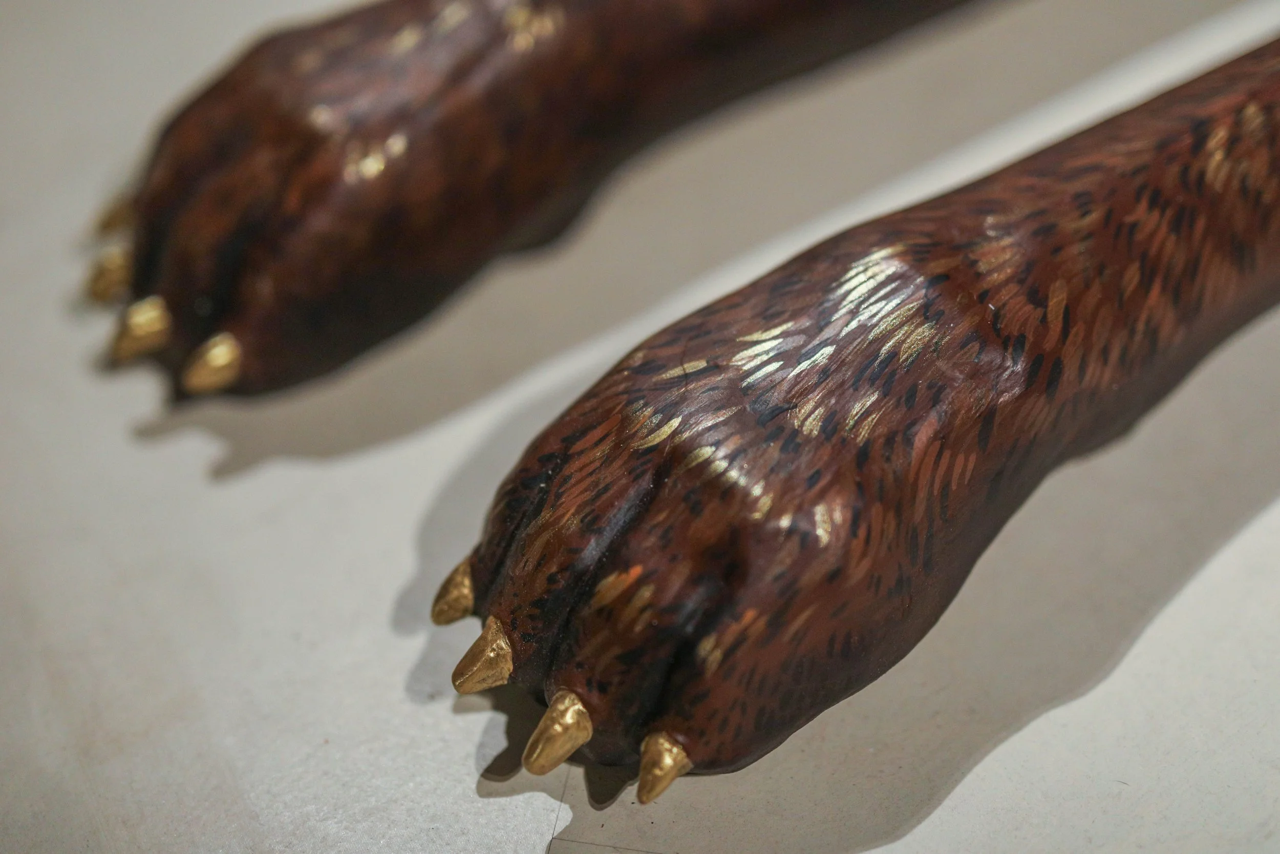 Detail: Becky Sellinger, Give A Dog a Good Name, 2026, Steel, foam, plastic, wood, rope, epoxy sculpt, servo motors, microprocessors, speaker, artist designed/printed PLA components, velvet, paint, 80 x 65 x 31

photo credit: Theo Cote