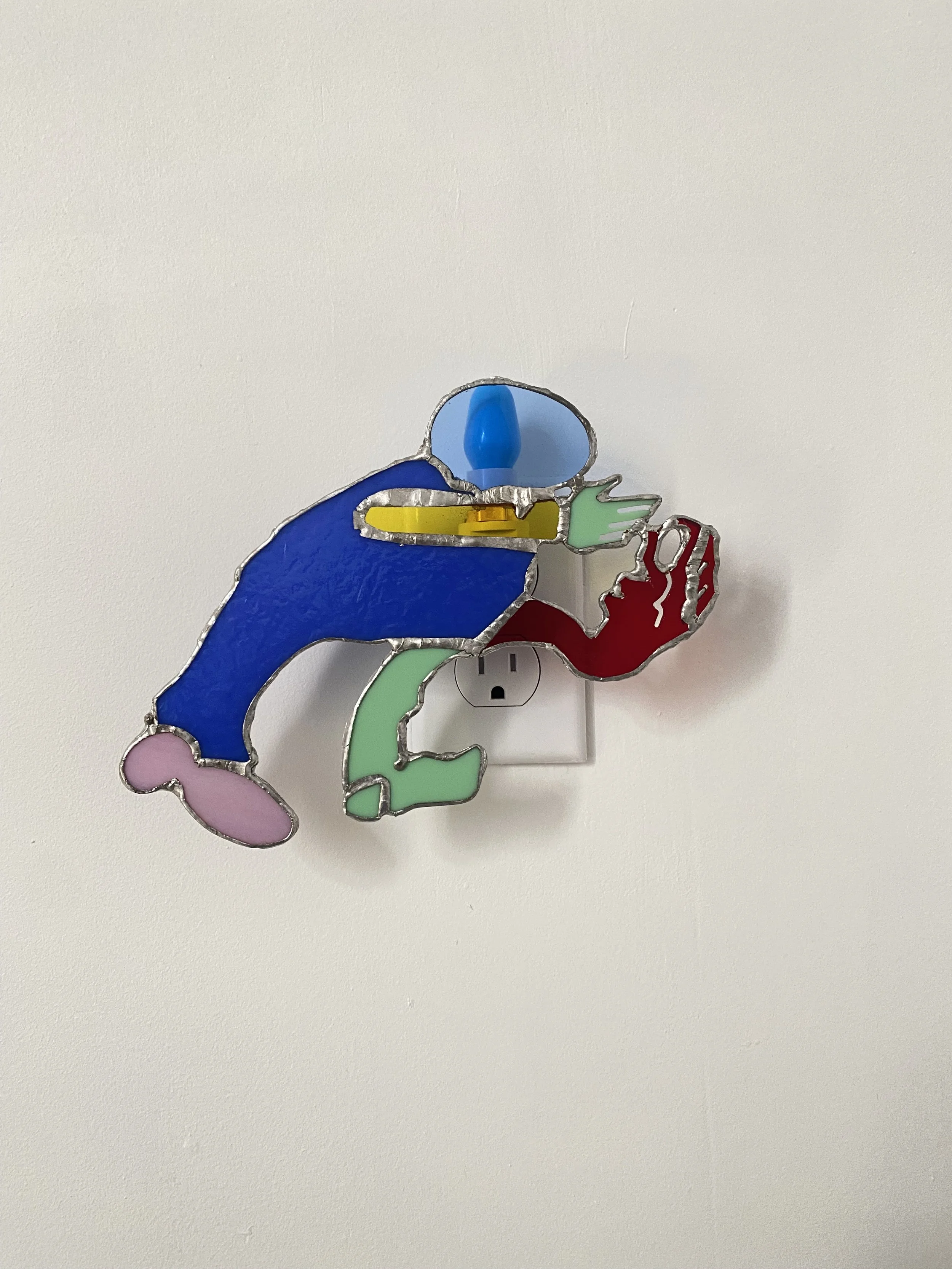 Jonny Campolo
Turn Off, 2022
Stained glass, silver solder, nightlight 
7 x 6.5 x 2 in