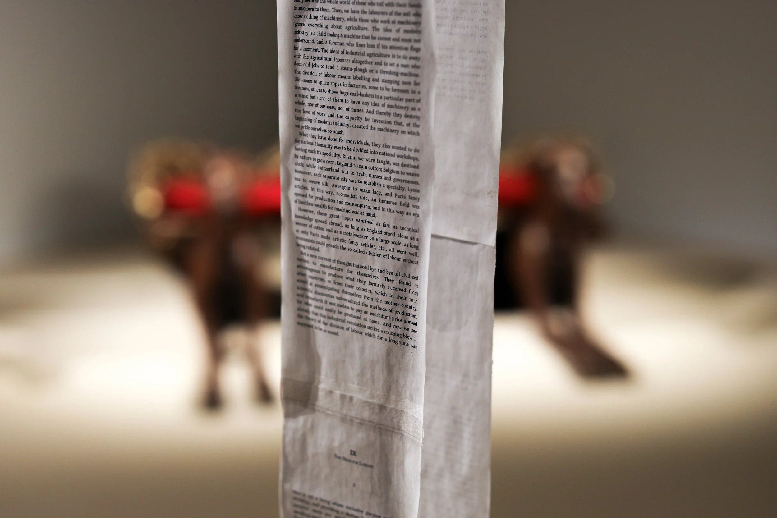 Detail: Becky Sellinger, La Conquête du pain, 2026, plaster, paint, mid century toaster, paper, faux wood drawer liner, motor 

photo credit: Theo Cote