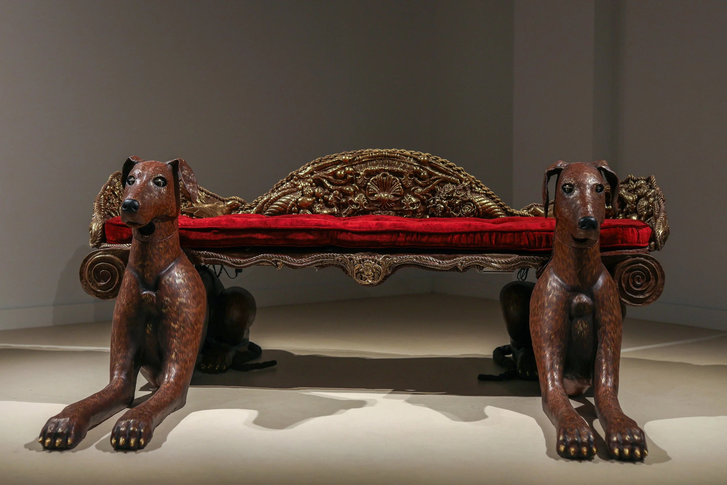 Becky Sellinger, Give A Dog a Good Name, 2026, Steel, foam, plastic, wood, rope, epoxy sculpt, servo motors, microprocessors, speaker, artist designed/printed PLA components, velvet, paint, 80 x 65 x 31

photo credit: Theo Cote