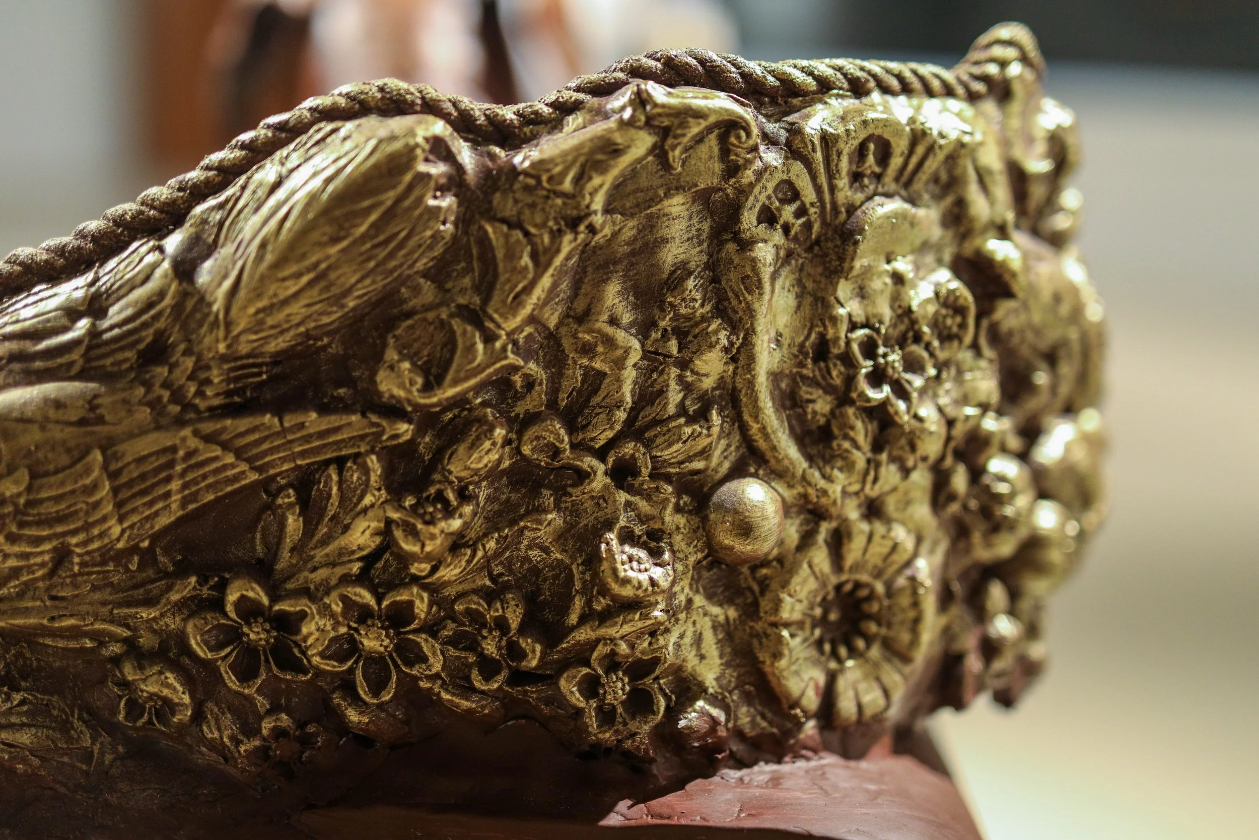 Detail: Becky Sellinger, Give A Dog a Good Name, 2026, Steel, foam, plastic, wood, rope, epoxy sculpt, servo motors, microprocessors, speaker, artist designed/printed PLA components, velvet, paint, 80 x 65 x 31

photo credit: Theo Cote