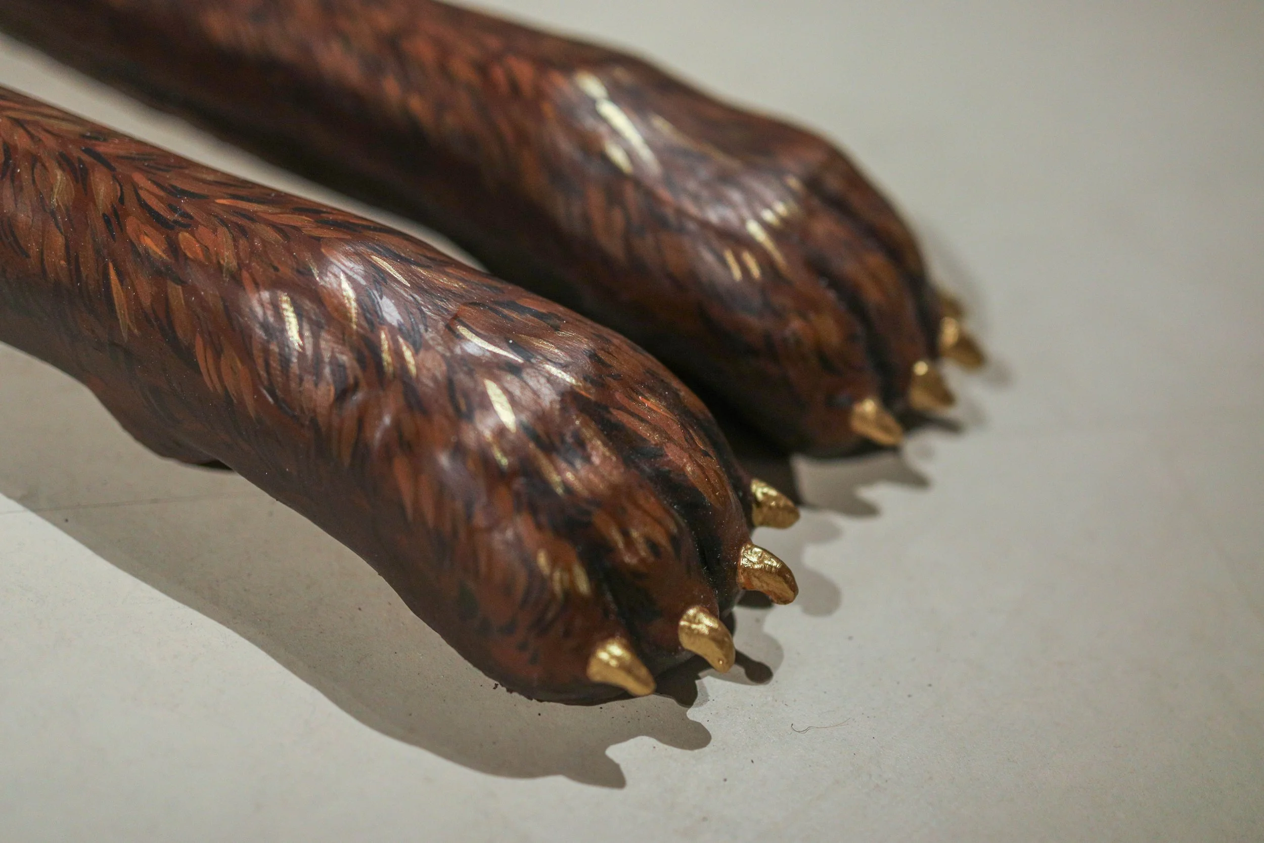 Detail: Becky Sellinger, Give A Dog a Good Name, 2026, Steel, foam, plastic, wood, rope, epoxy sculpt, servo motors, microprocessors, speaker, artist designed/printed PLA components, velvet, paint, 80 x 65 x 31

photo credit: Theo Cote