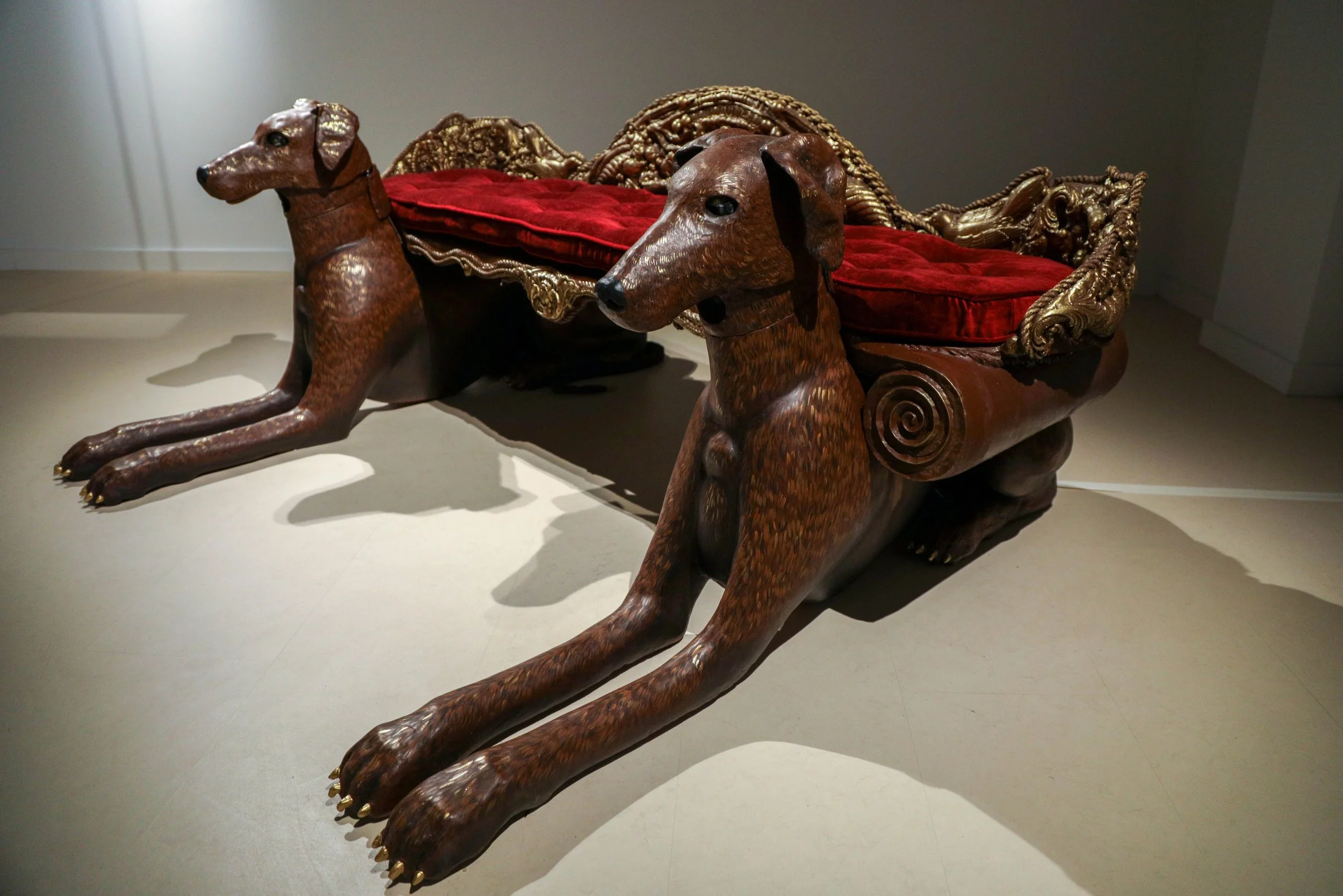 Detail: Becky Sellinger, Give A Dog a Good Name, 2026, Steel, foam, plastic, wood, rope, epoxy sculpt, servo motors, microprocessors, speaker, artist designed/printed PLA components, velvet, paint, 80 x 65 x 31

photo credit: Theo Cote