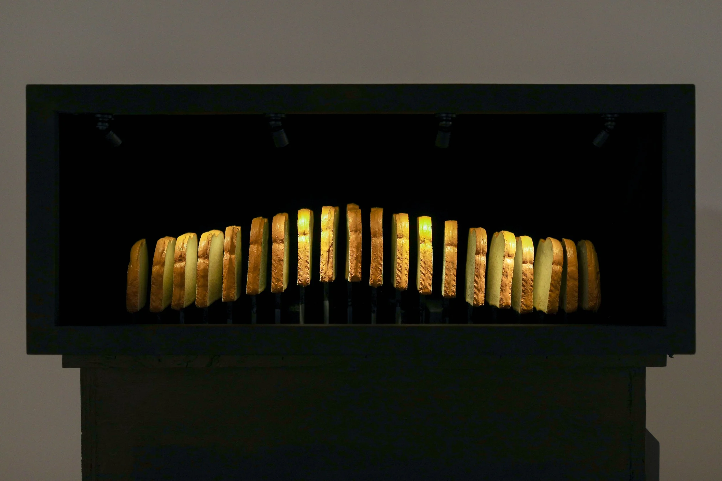 Becky Sellinger, Best Thing Since Sliced Bread, 2026, a loaf of bread, plywood, velvet, paint, felt, silicone, steel, lasercut acrylic, motor, artist designed/printed PLA components, epoxy, lacquer, 30 x 22 x 11

photo credit: Theo Cote