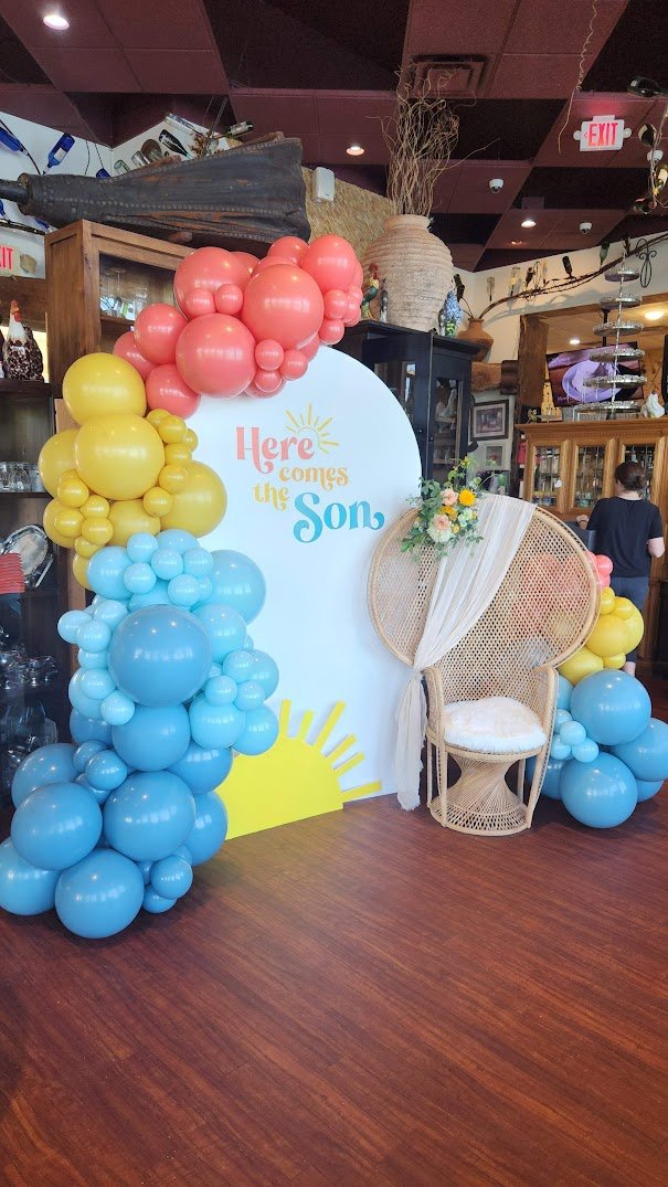 Here comes the sun backdrop with chair.jpg