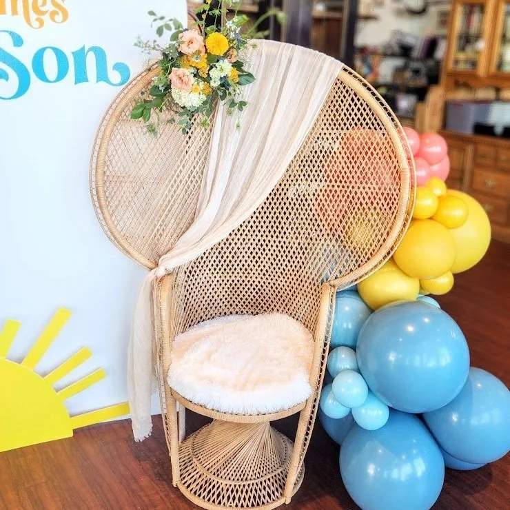 peacock chair with flowers.jpg