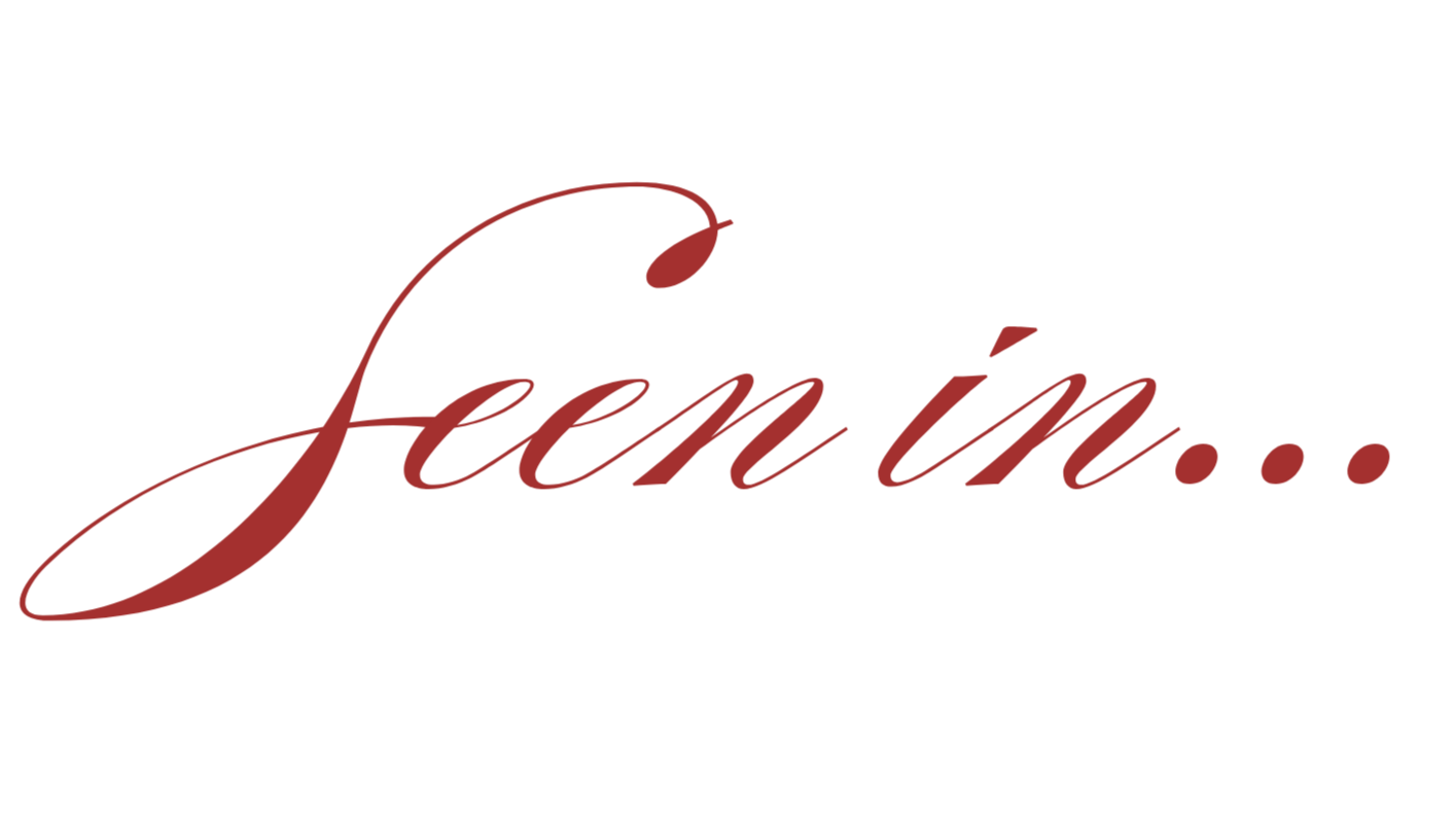 The words "Seen in..." written in elegant, cursive, maroon font on a black background.