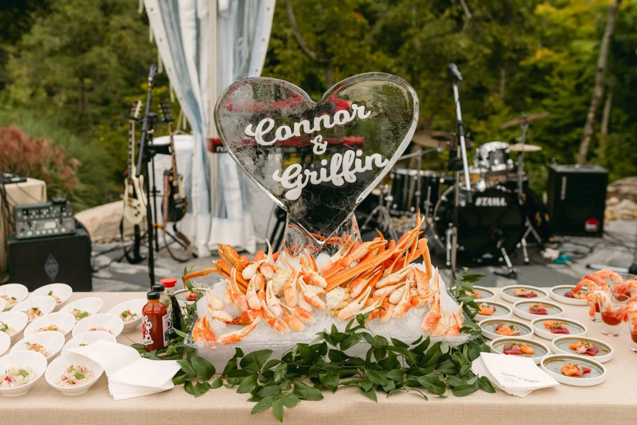 cold seafood station with custom ice sculpture