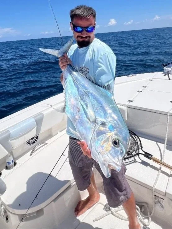 Captain Dj  holding a African Pompano offshore