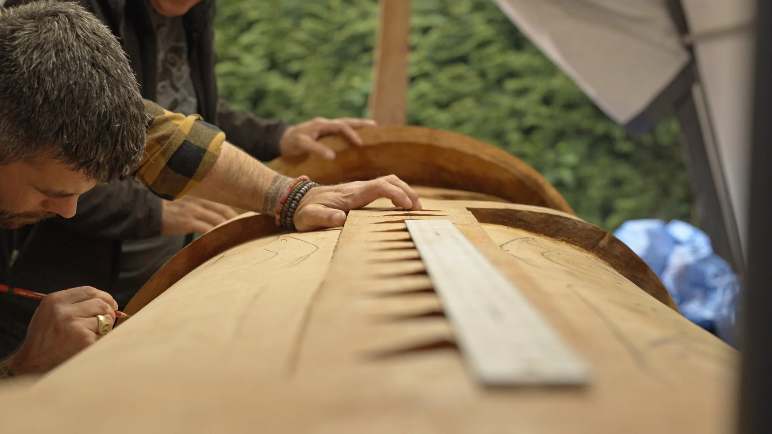 Raphael Silver working on totem pole