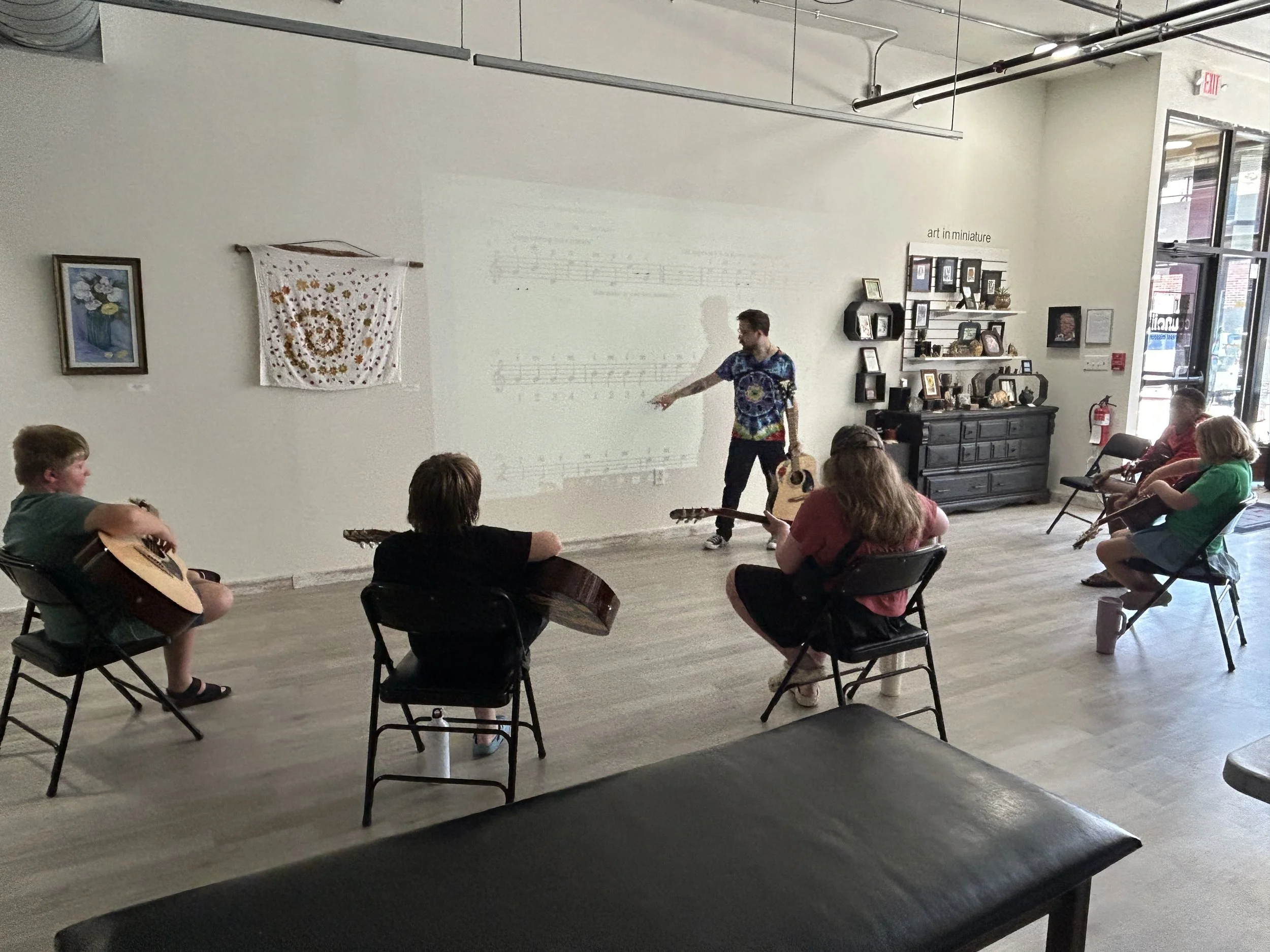 Strings with Steele Students Learning to Play Guitar