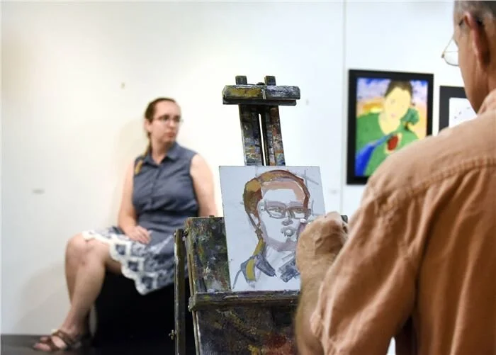 Artist Craig Thomas Painting Live Model