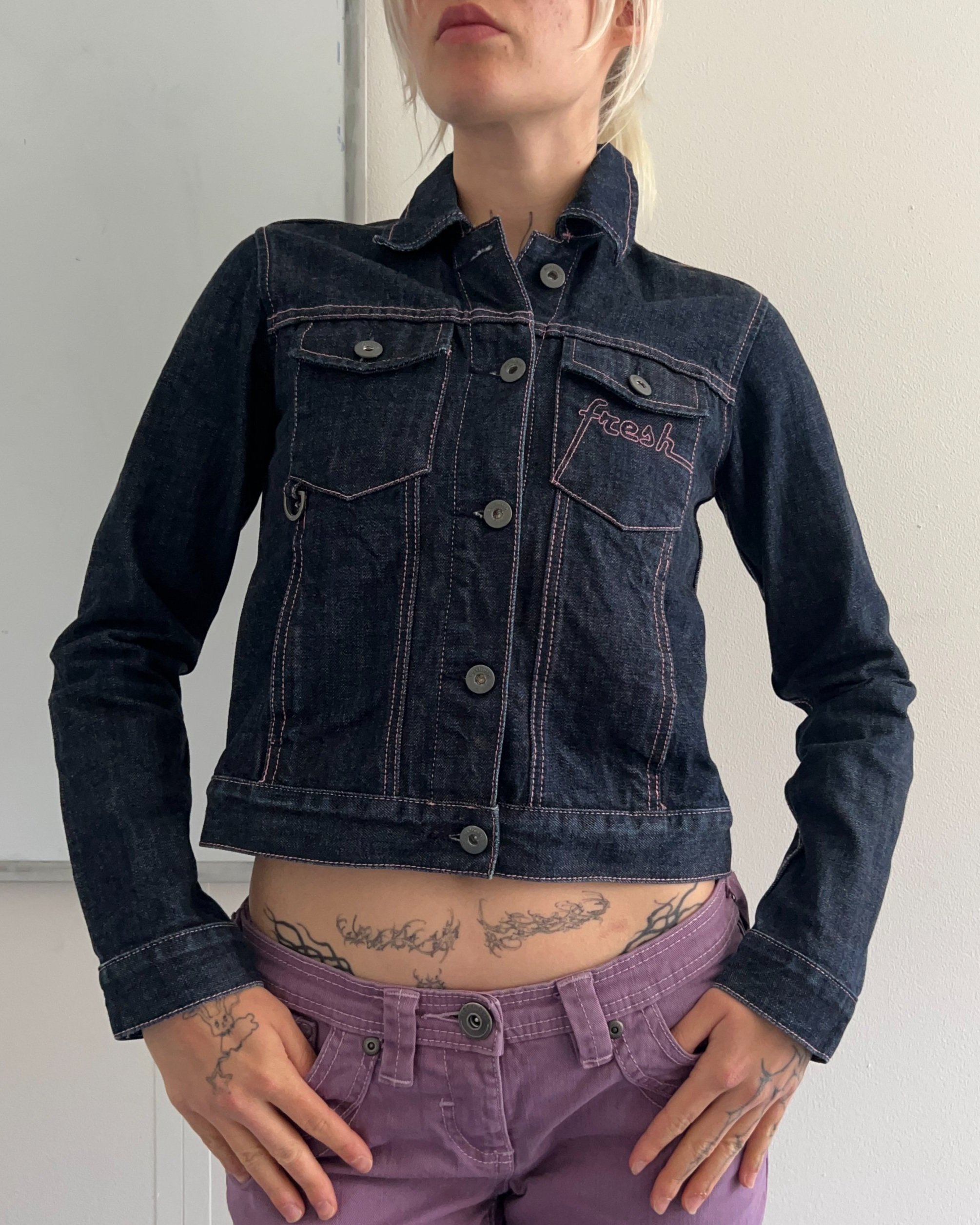 Navy denim jacket with pink details