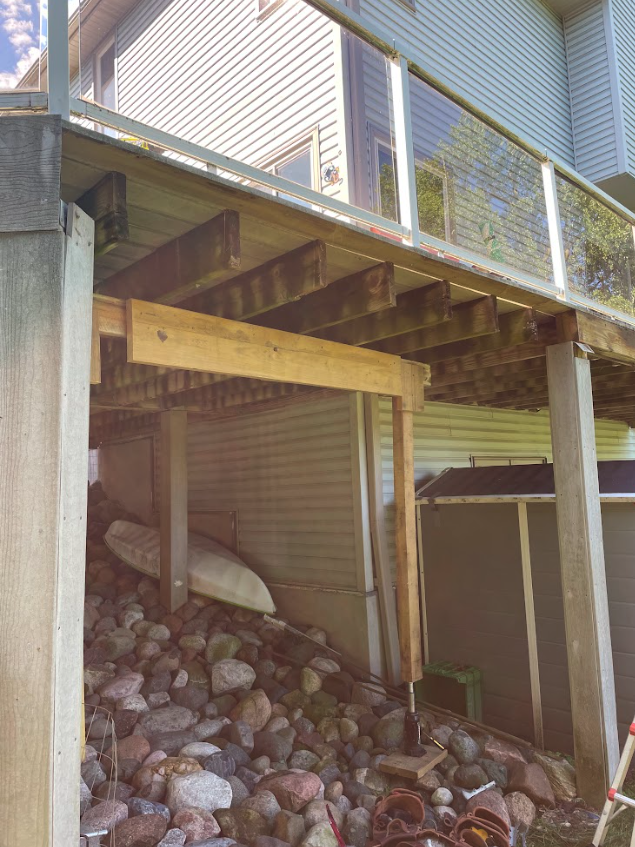 During wooden deck joist repair in Eagan Minnesota