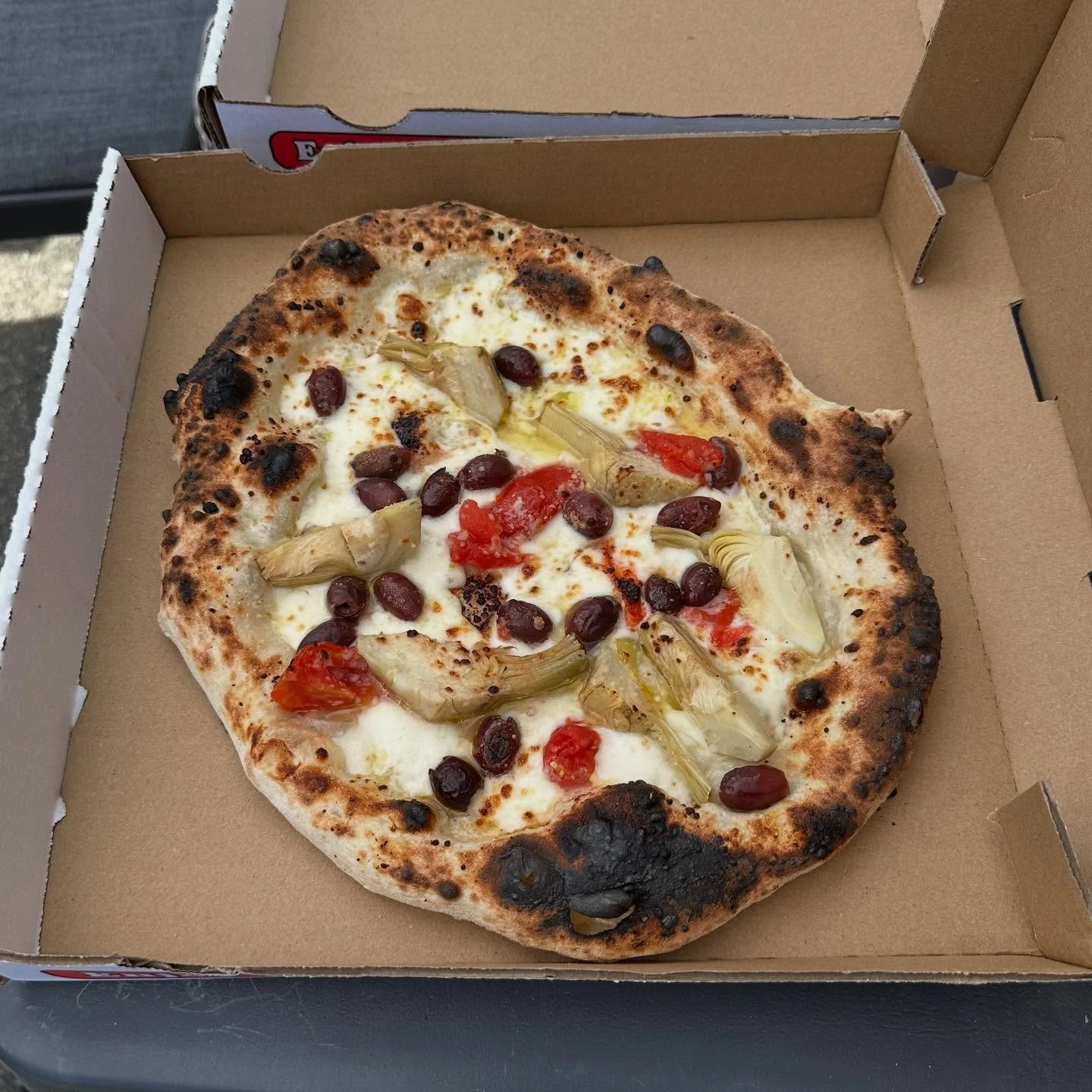 dang, today I couldn&rsquo;t decide between the savory creaminess of the Vegeteriana 🌿 artichoke pizza or that sizzling, fresh flavors of our classic Margherita🍅&hellip;so just ordered both 😅🍕
~
#neapolitanpizza #artichokepizza #margheritapizza #