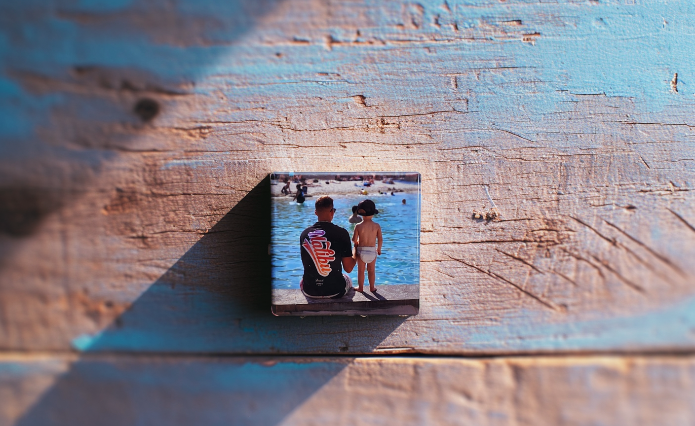 Celebrate beachside memories with this personalised magnet featuring a father and child. A beautiful way to display cherished moments on your fridge or magnetic surface.