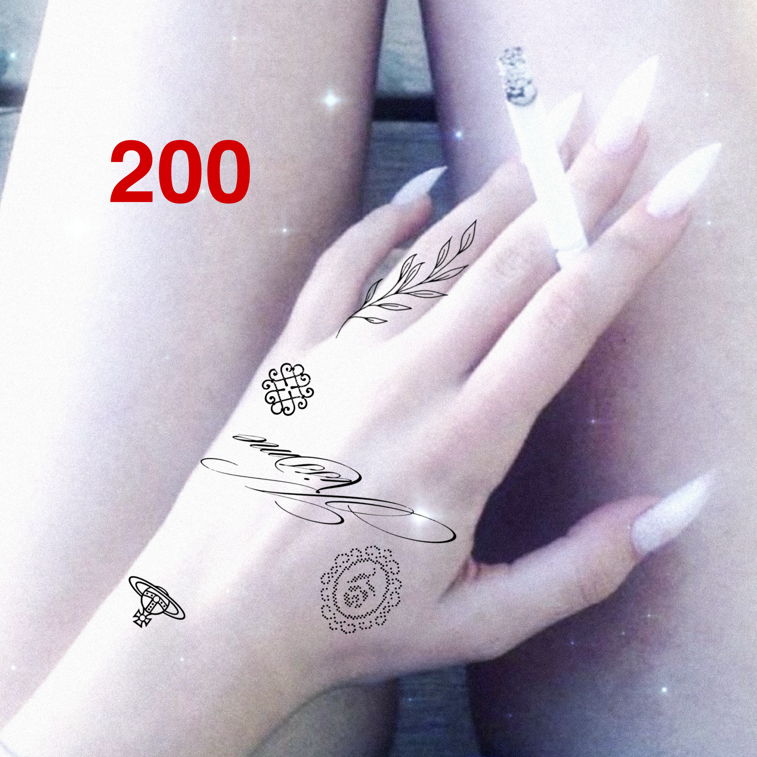 A hand resting on a surface, with a cigarette in the fingers, and tattoos on the hand and wrist. The tattoos include various designs such as leaves, circular patterns, and text. The number '200' is displayed in red at the top left of the image.