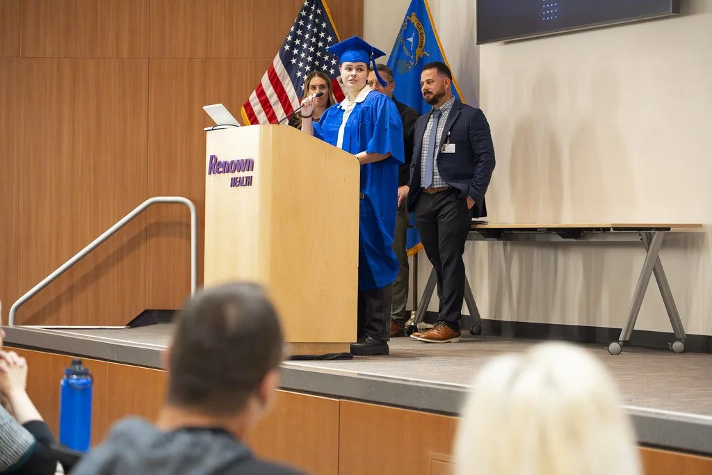 2024 Renown Grad Class - Grad at Podium.jpg