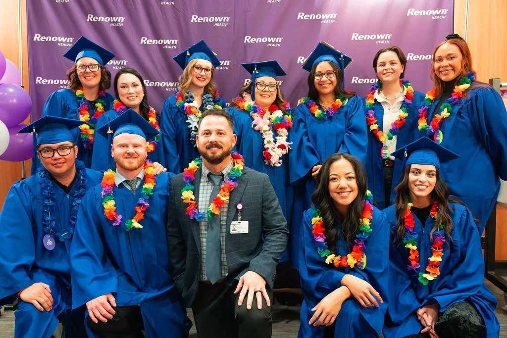 2024 Renown Grad Class With John and Purple Background.jpg