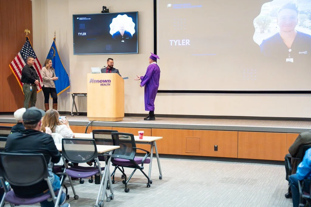 Renown Graduating Class 2025 - Tyler Receiving Diploma.jpg