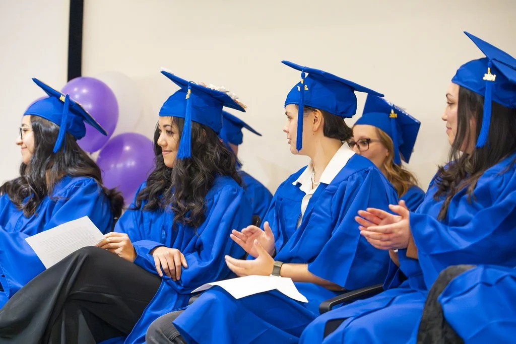 2024 Renown Grad Class Seated and Applauding.jpg