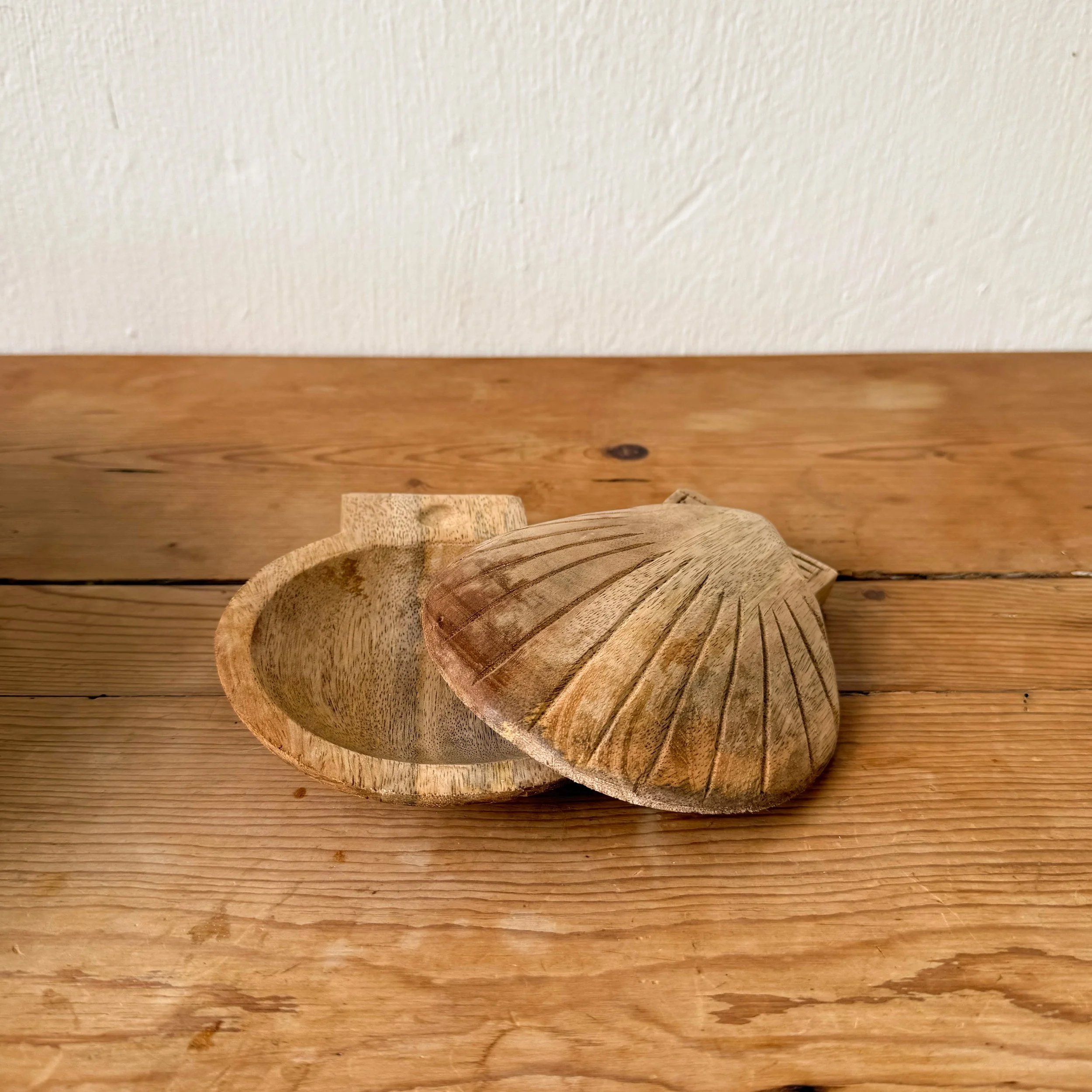 5-inch hand-carved mango wood shell-shaped salad servers by Sukha Space