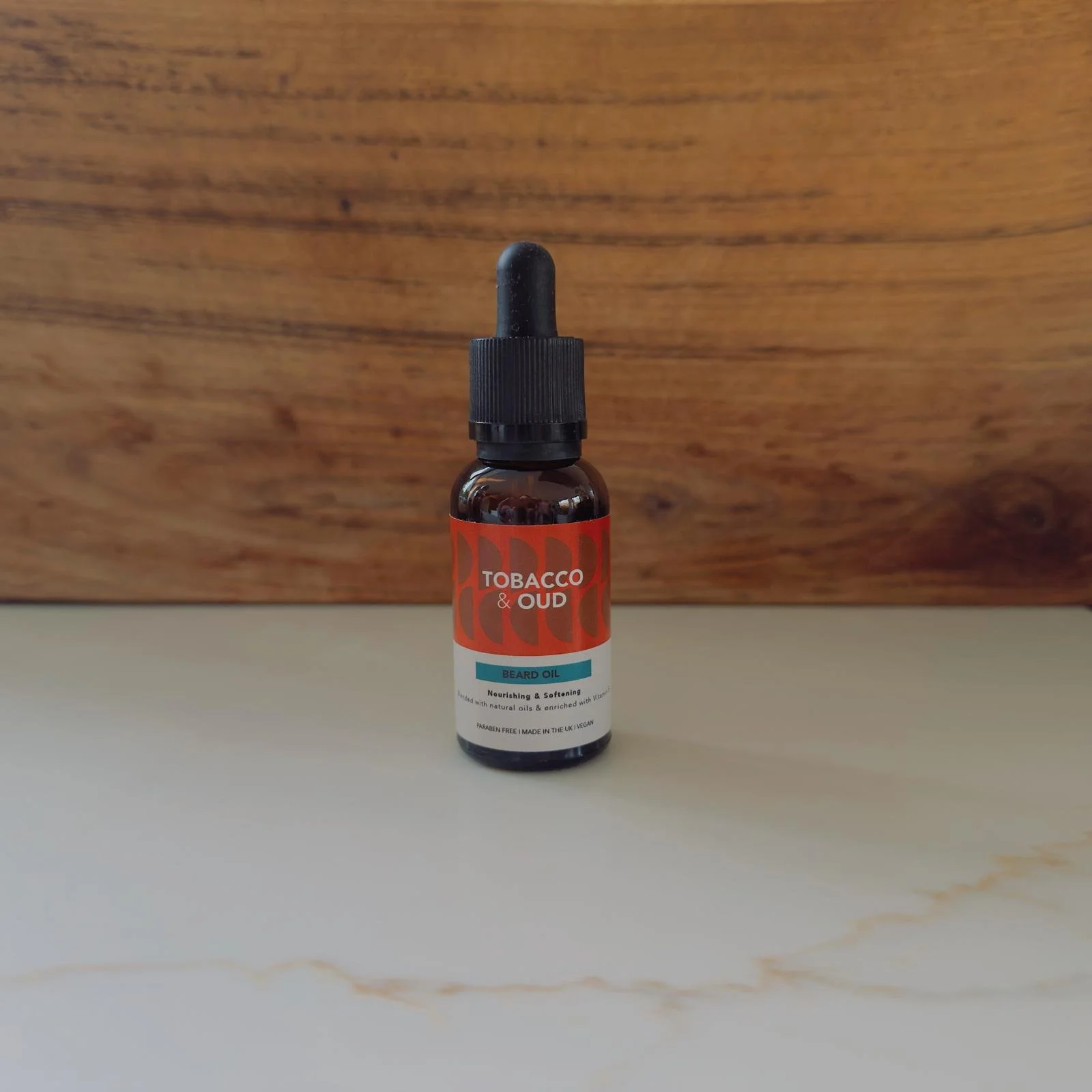 Tobacco and Oud beard oil  product from Courage | Noble barbershop