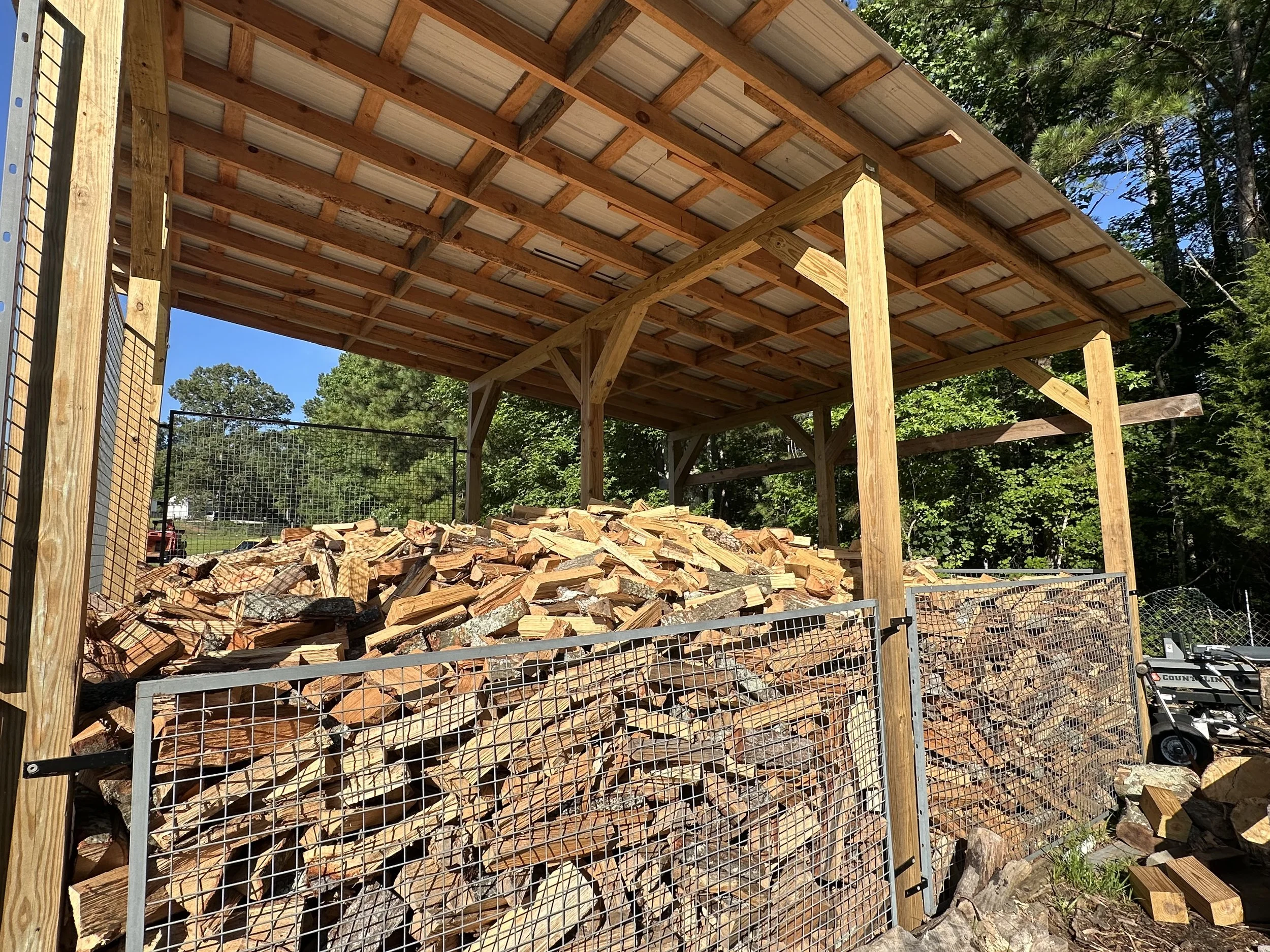 firewood stacked from tree removal