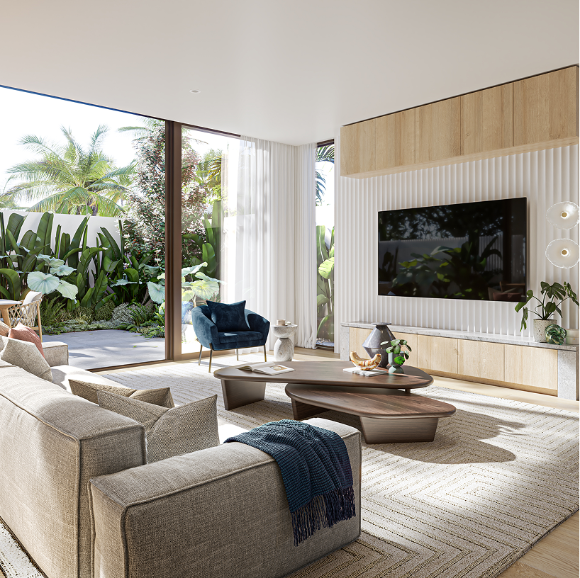 Modern living room with large windows, gray sofa, blue armchair, wooden coffee table, wall-mounted TV, indoor plants, and outdoor garden view.