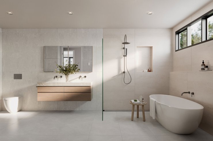 Modern bathroom with freestanding bathtub, walk-in shower, wall-mounted vanity, large mirror, and minimalist decor.