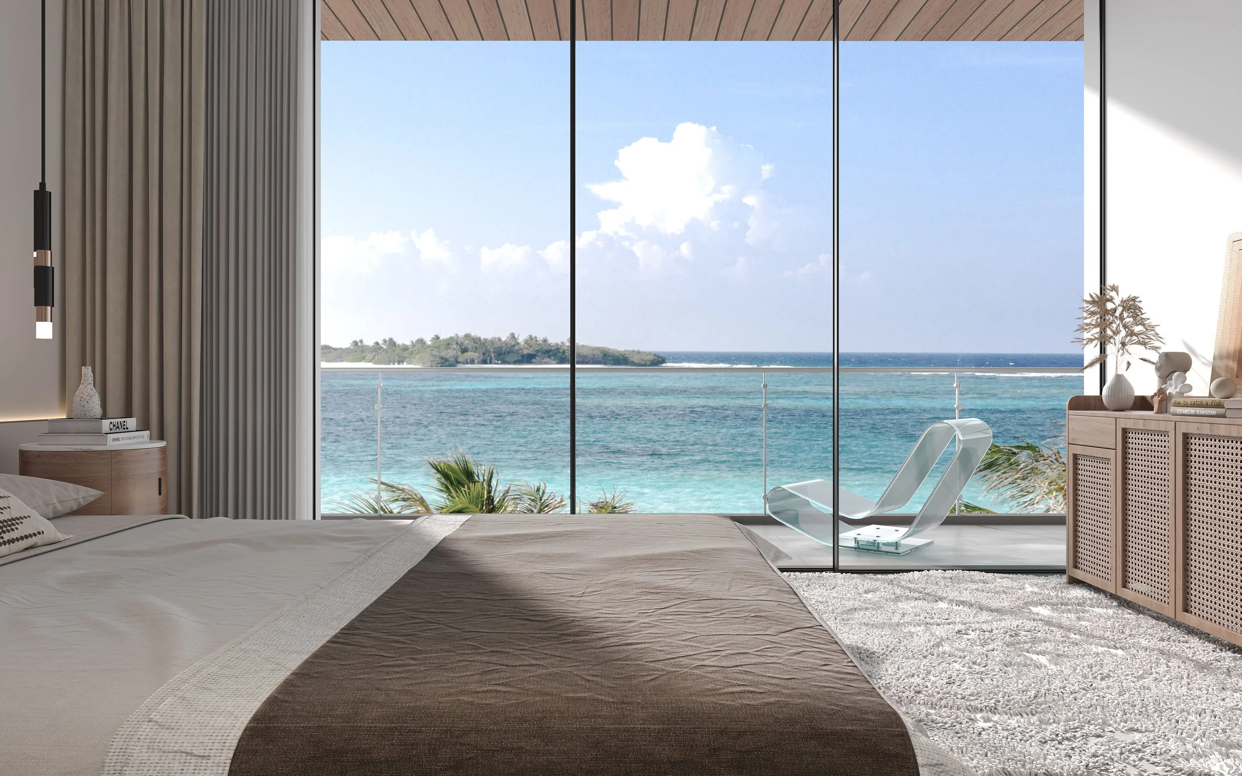Luxurious bedroom with large window view of ocean and island, featuring modern furniture and decor.