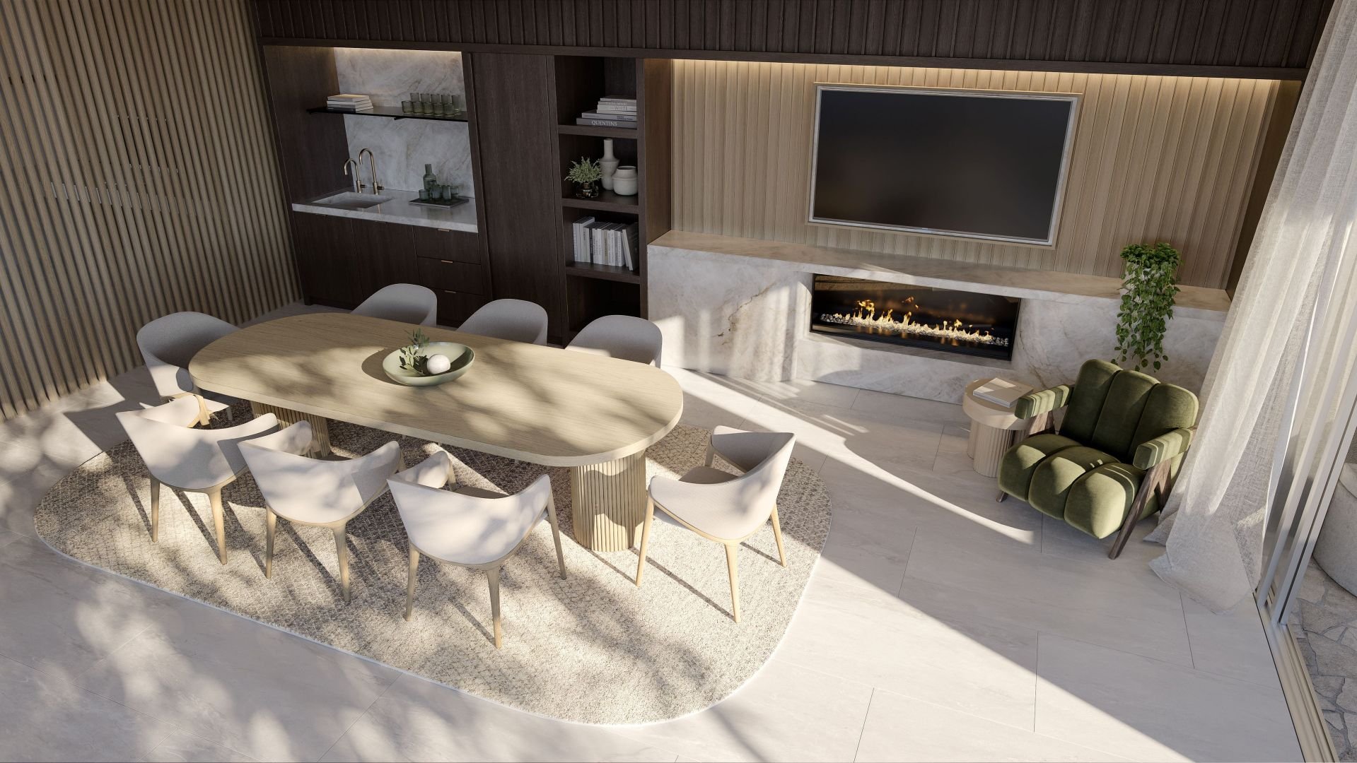 Modern dining room with a large oval table, eight chairs, a built-in fireplace, wall-mounted TV, wet bar, bookshelves, and a green armchair.