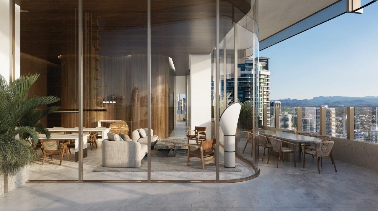Luxury apartment balcony with modern furniture, glass walls, mountain view, and cityscape.