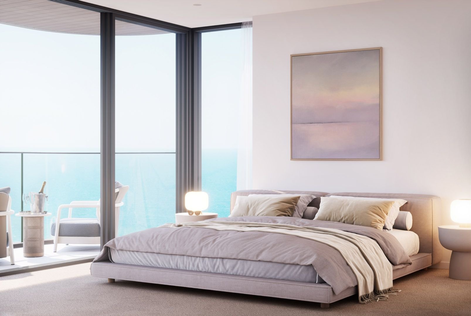 Modern bedroom with large windows, ocean view, cozy bed, neutral colors, nightstands with lamps, and wall art.