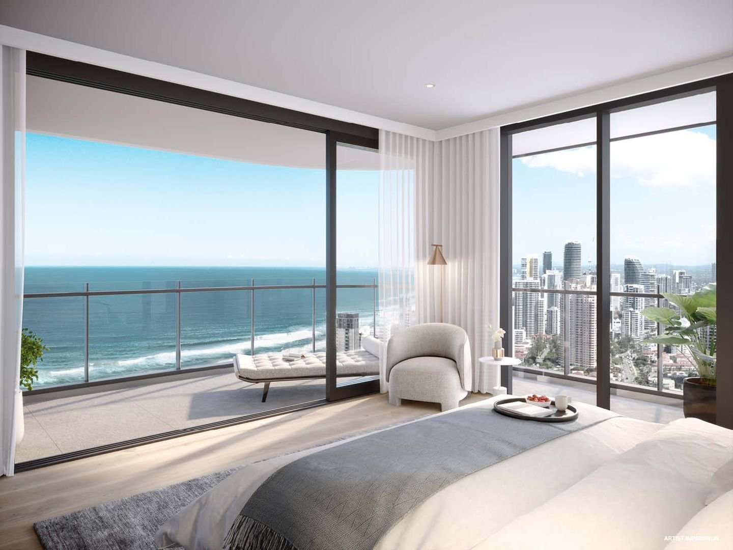Modern bedroom with ocean and city views, featuring glass doors leading to a balcony with a lounge chair. The room includes a bed, a chair, a small side table with a lamp, and decorative plants.