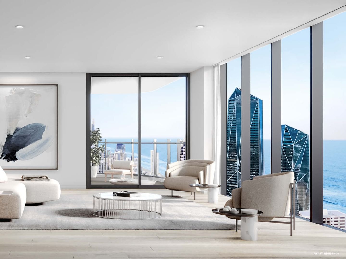 Modern living room with large windows offering a city and ocean view, featuring minimalist furniture, abstract artwork, and a round coffee table.