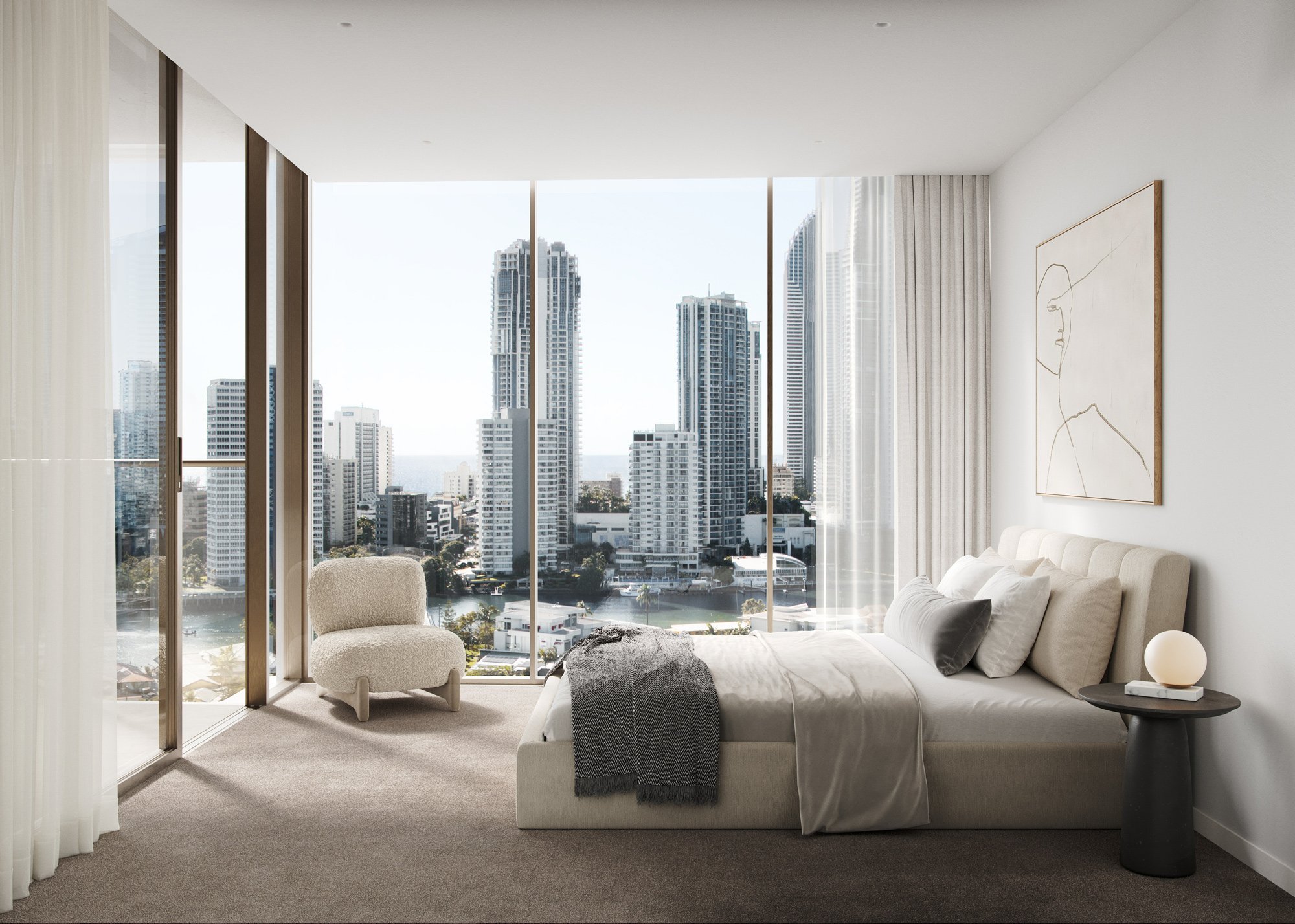 Modern bedroom with a large window overlooking a city skyline, featuring a beige upholstered bed, a small round side table with a lamp, a plush chair, and a line drawing art piece on the wall.