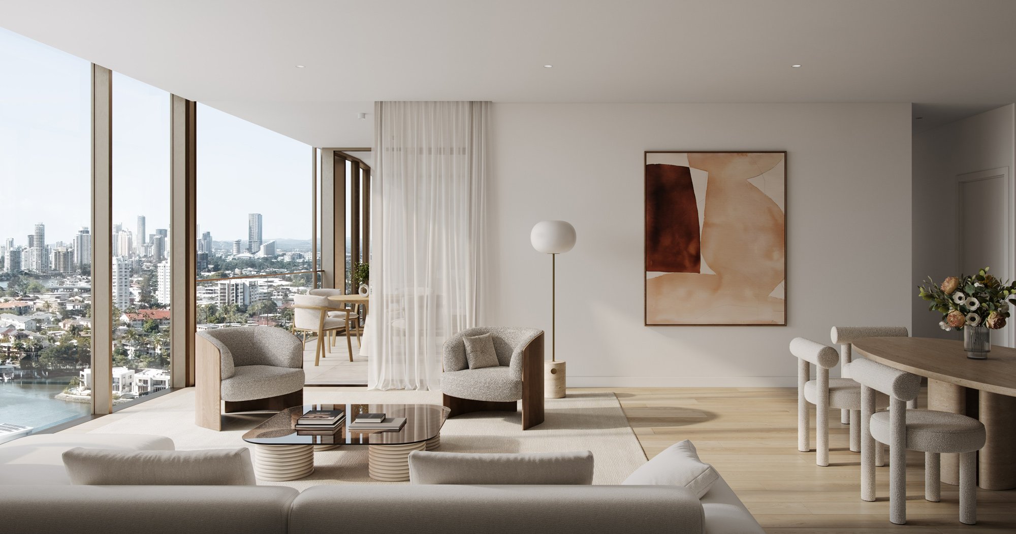 Modern living room with large windows, neutral furnishings, contemporary decor, city skyline view, wooden flooring, abstract artwork, and a vase of flowers on the dining table.