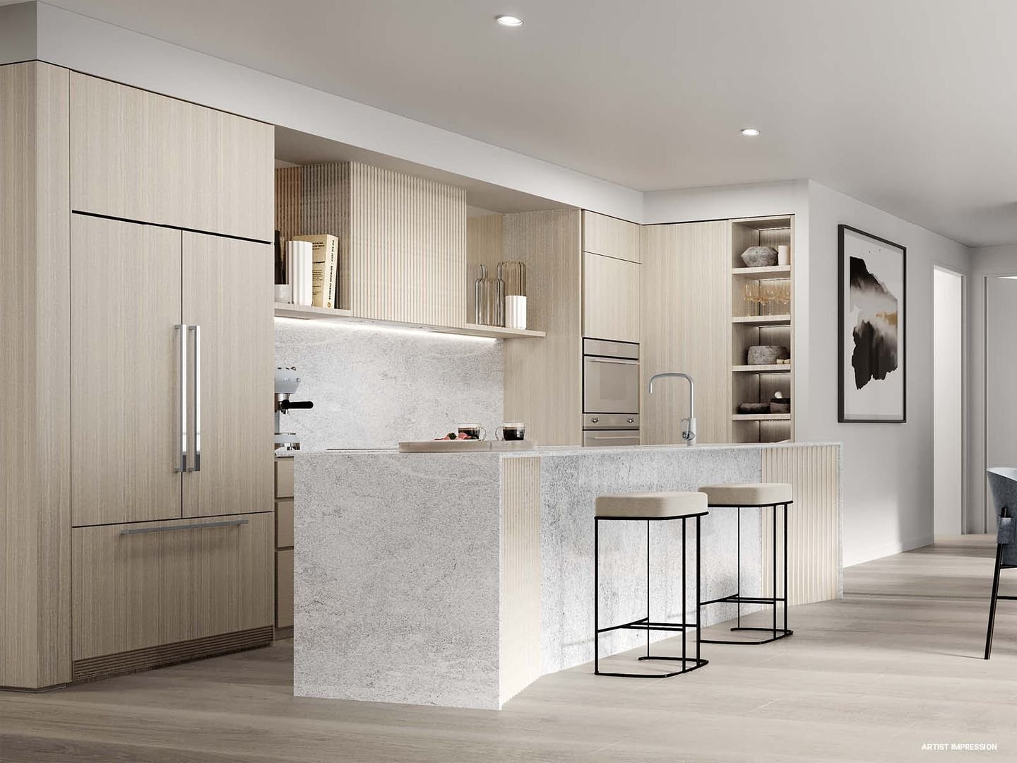 Modern kitchen with light wood cabinets, marble countertops, built-in oven, and bar stools